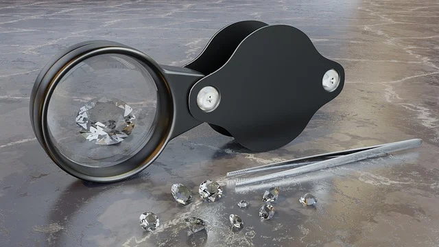 A jeweler's loupe inspecting loose gemstones with tweezers nearby