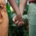 couple hands wedding rings