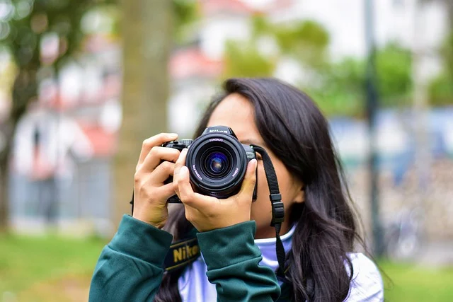 A person holding a camera up to take a picture