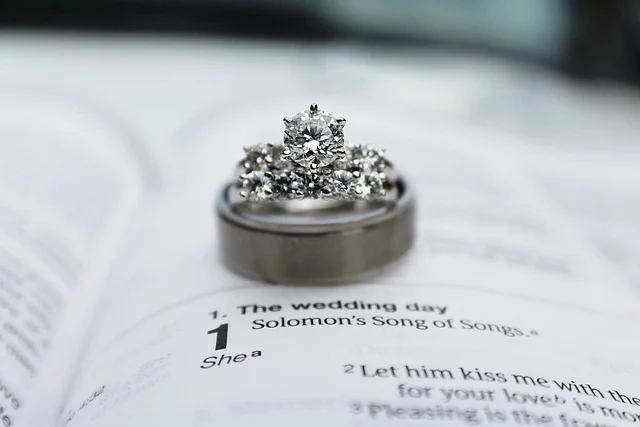 Moissanite versus cubic zirconia: A sparkling ring set resting on an open book
