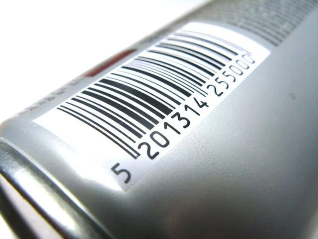 A close-up photo of a barcode on a metallic product