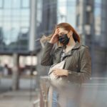 woman wearing beige dress