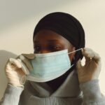 woman wearing asymmetrical top