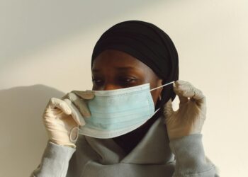 woman wearing asymmetrical top