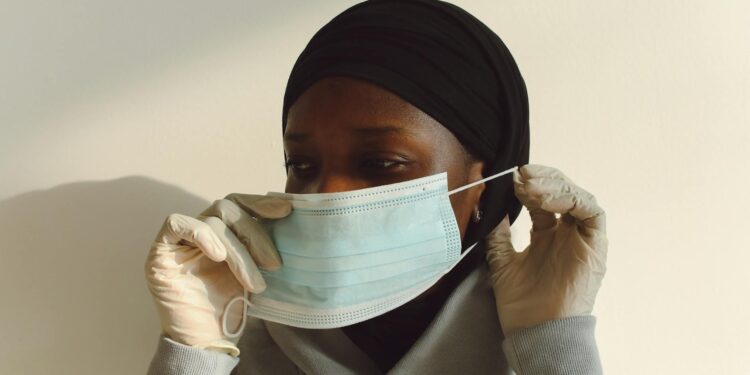 woman wearing asymmetrical top