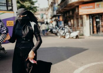 woman wearing stylish black jacket