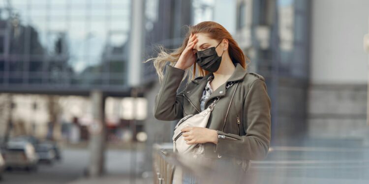 woman wearing orange top
