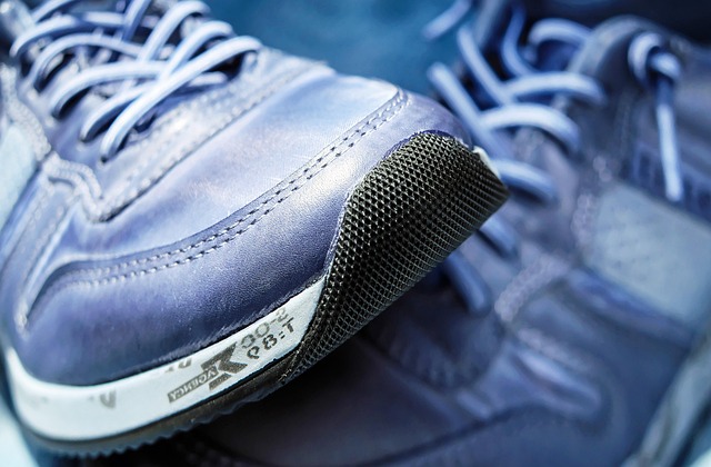 Close-up of a chunky sneaker sole showing its layered construction and material.