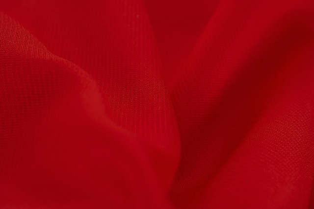 close-up of luxurious silk satin fabric draping elegantly (best dress for a romantic dinner date)