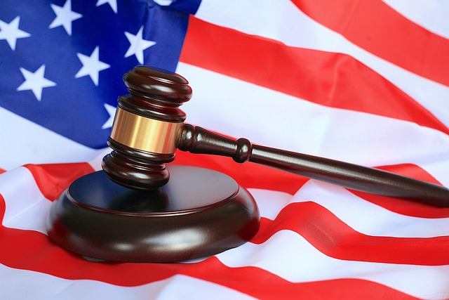 Courtroom illustration of a gavel and legal books