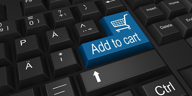 Customer packing an online order into a box for return shipping