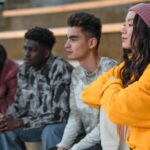 diverse people wearing white sneakers