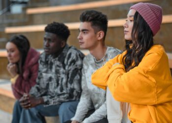 diverse people wearing white sneakers