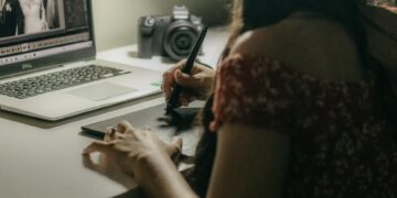 fashion editor working at desk