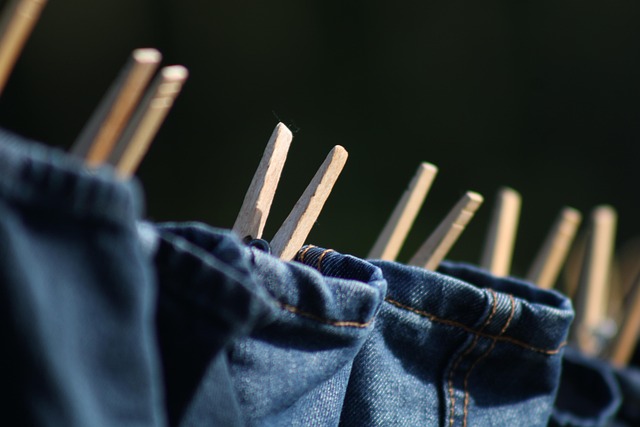 Historical evolution of denim jacket designs from workwear to fashion icon