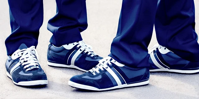 Formal trousers paired with casual sneakers