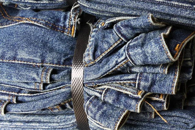 A bundle of blue denim jeans strapped together