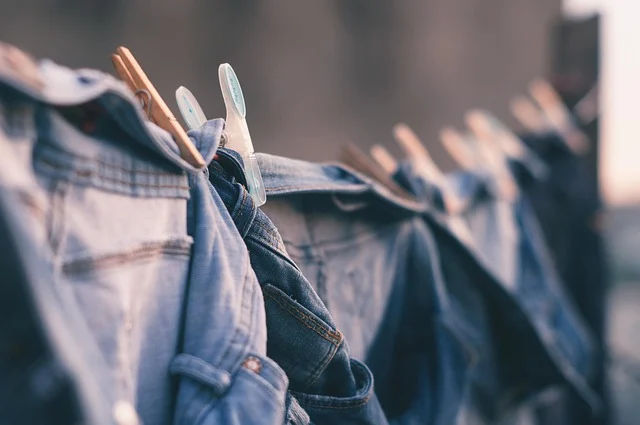 Clothes hanging on a clothesline with clothespins to air dry