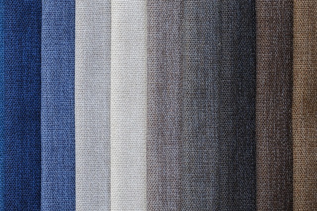A close-up view of various textured fabric swatches in different colors