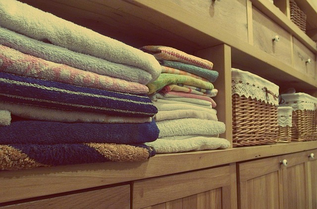 A neatly organized fall capsule wardrobe with essential clothing items and accessories.
