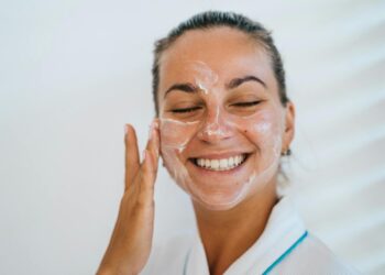 person applying gentle cleanser