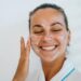 person applying gentle cleanser