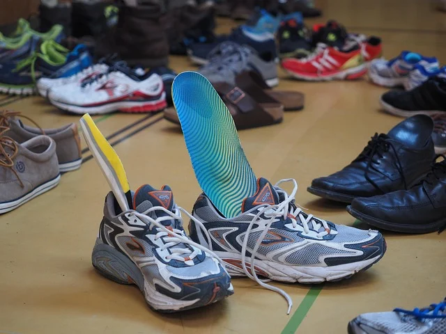 Athletic shoes with insoles pulled up and sticking out