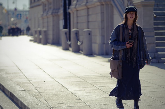 Street style outfit featuring Jordan 12 Flu Game sneakers with black jeans and a hoodie