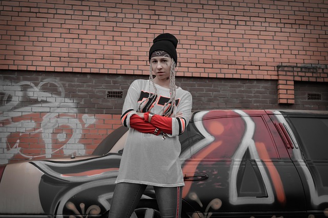 Streetwear outfit featuring Jordan 3s with cuffed jeans and a graphic t-shirt