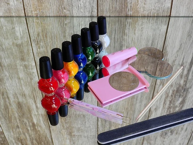 Bottles of colorful nail polish and nail art stamping tools