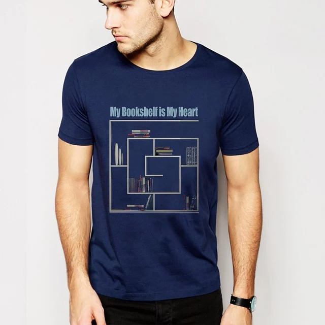 A man wearing a navy graphic t-shirt with a bookshelf graphic