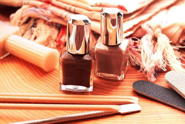 Nail polish bottles, manicure tools, and nail files on a surface