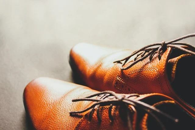 A pair of brown leather dress shoes