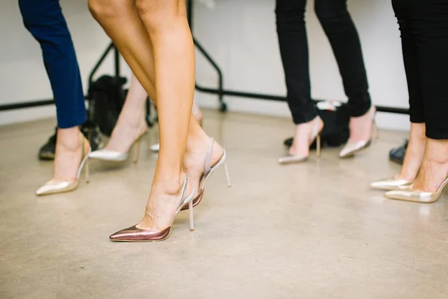 Women wearing metallic silver and gold slingback high heels