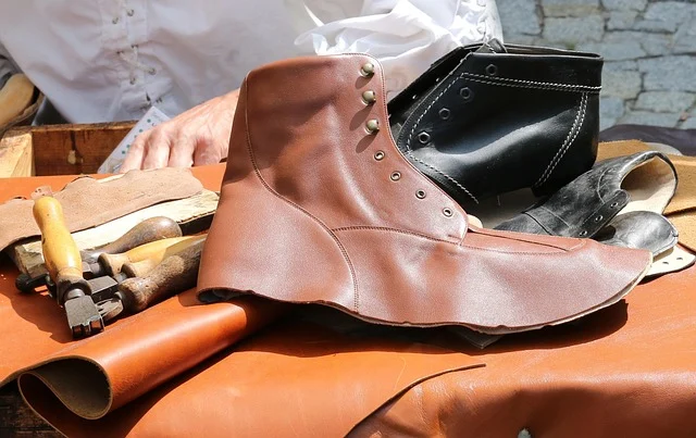 Handcrafted leather shoe upper and cobbler tools