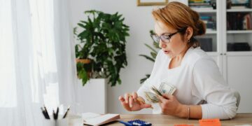woman organizing budget workwear wardrobe