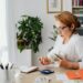 woman organizing budget workwear wardrobe