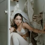 woman organizing wardrobe staples