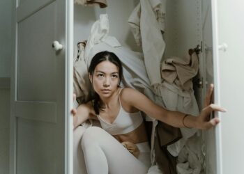 woman organizing wardrobe staples