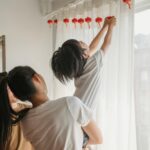 woman styling curtain bangs
