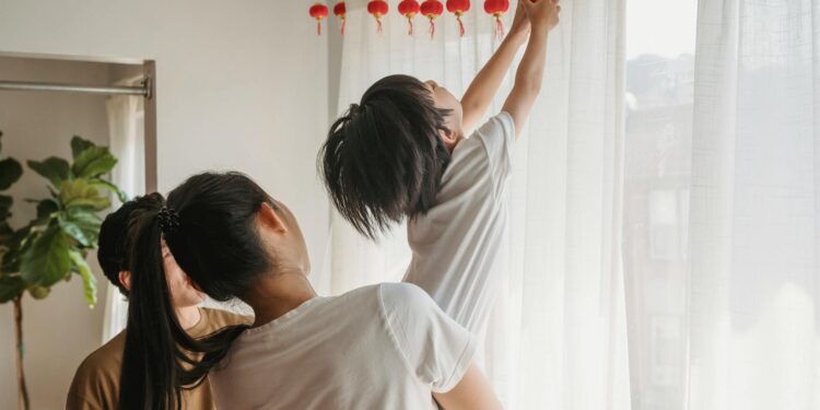 woman styling curtain bangs