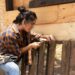 woman wearing carpenter pants summer outfit
