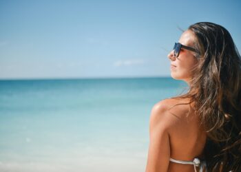 woman wearing stylish pink bikini