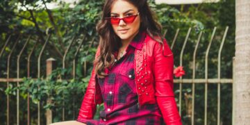 woman wearing red cardigan