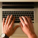 writer at computer creative