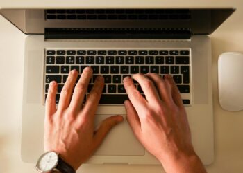 writer at computer creative