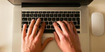 writer at computer creative