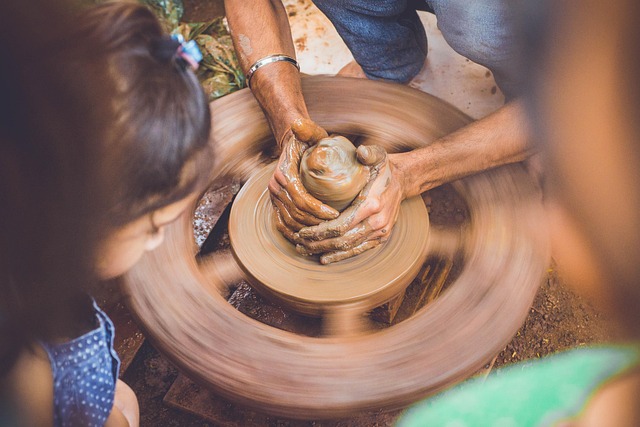 Photo of an Austrian artisan working on a traditional craft, like pottery or woodworking