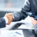 business owner signing loan agreement