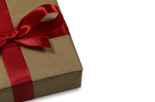 Close-up of a birthday gift box from Ulta with a coupon peeking out